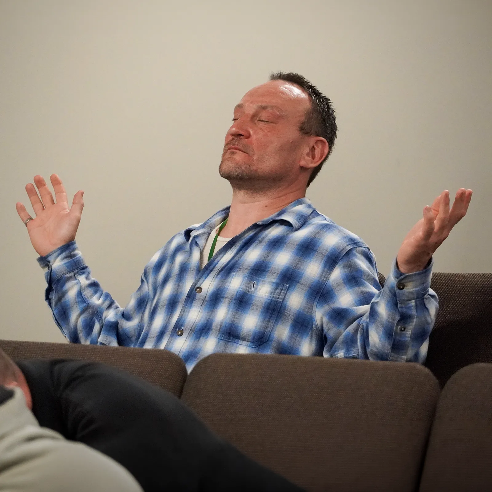 man transformed praising the Lord