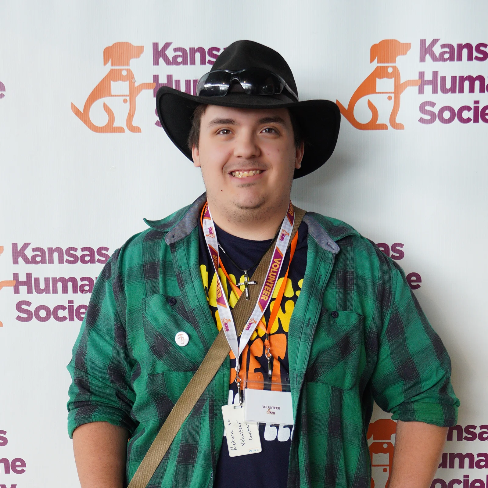 young man volunteering with kansas humane society
